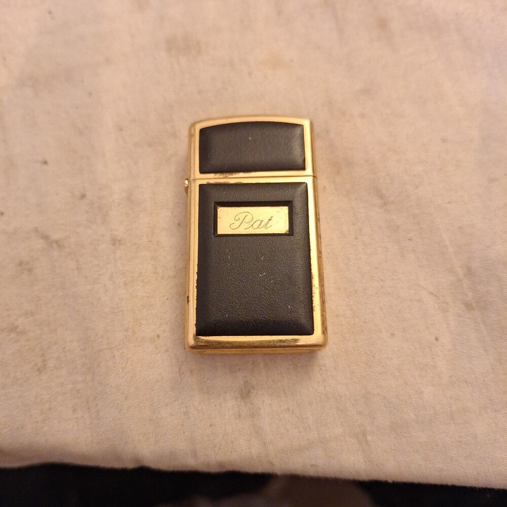 VINTAGE ZIPPO SLIM 1993 A-IX GOLD & BLACK CIGARETTE LIGHTER. ENGRAVED Pat